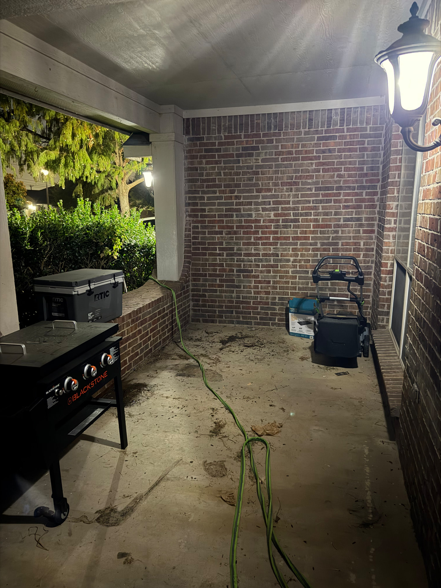 After junk removal: the same Burleson patio cleared and swept by D&A Haul Away